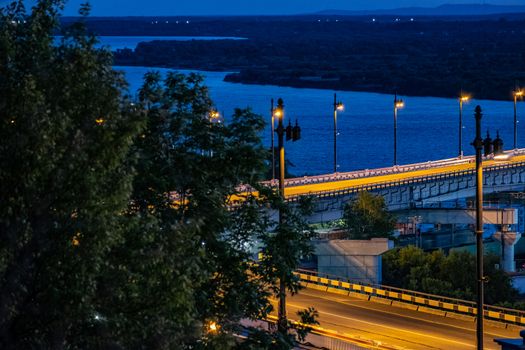 Bridge over the Amur river in Khabarovsk, Russia. Night photography.