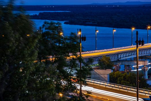 Bridge over the Amur river in Khabarovsk, Russia. Night photography.