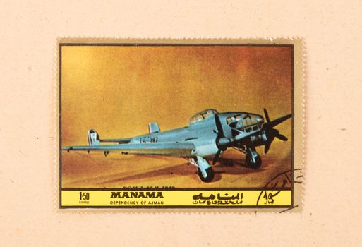 UNITED ARAB EMIRATES - CIRCA 1980: A stamp printed in the UAE shows an old airplane, circa 1980