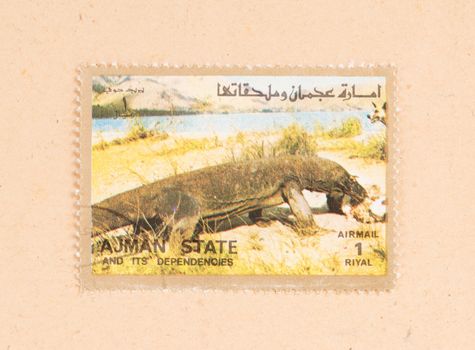 UNITED ARAB EMIRATES - CIRCA 1980: A stamp printed in the UAE shows a komodo dragon, circa 1980