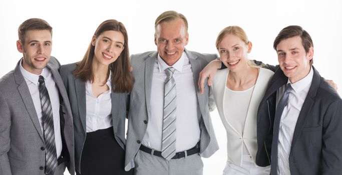 Group portrait of business people embracing studio isolated on white background