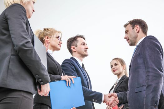 Handshake of business people team on white background