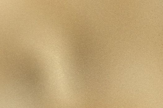 Glowing light brown brushed metal wall, abstract texture background