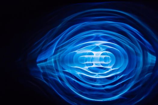 Sound waves in the visible blue color in the dark