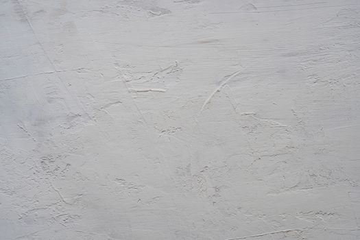 Close up texture of grey color painting on plywood wall.