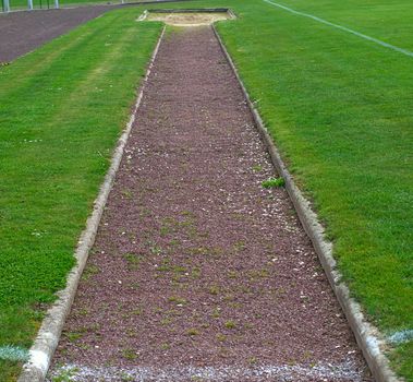 Long jump path on a stadium, front view