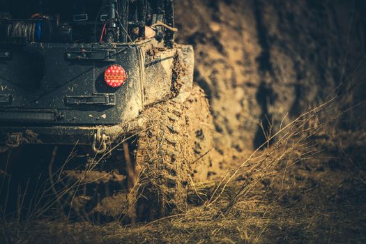 Extreme Off Road Car Trip. Vehicle on a Muddy Trail. Automotive and Motorsport Industry.