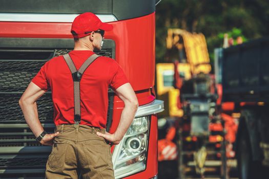 Semi Truck Driver in His 30s. Euro Transportation Concept. Transport Industry.