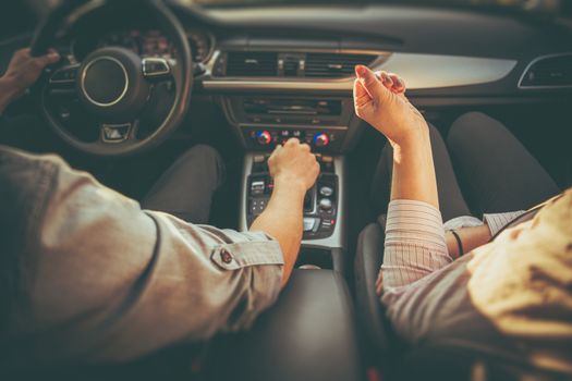 Caucasian Couple Arguing in the Modern Car While on the Road Trip. 