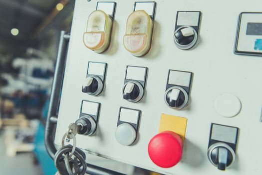 Industrial Machine Operating Console Closeup Photo.