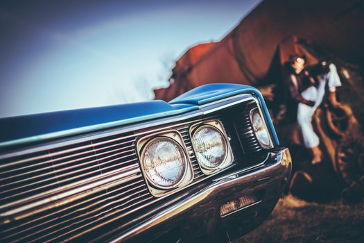 American Classic Ride and the Cowboy Relaxing on the Rusty Locomotive in the Background.