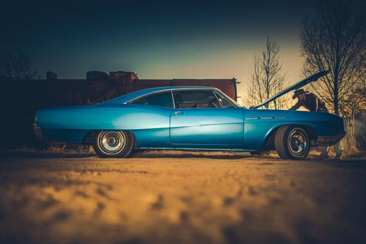 Broken Car Problem.. Caucasian Men Wester Wear Trying To Fix His Classic Ride in the Remote Countryside Place.