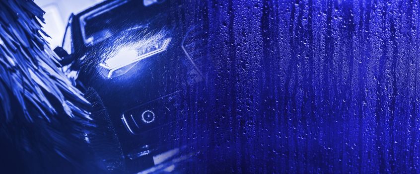 Washing Car Banner Background. Modern Vehicle in the Car Wash. Blue Color Grading. 