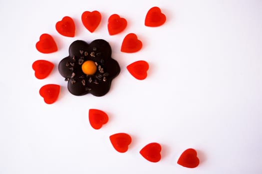 confectionery - marmalade in the form of a heart and cookies in the form of a flower