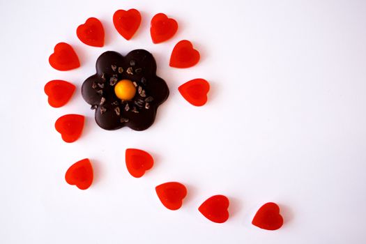 confectionery - marmalade in the form of a heart and cookies in the form of a flower