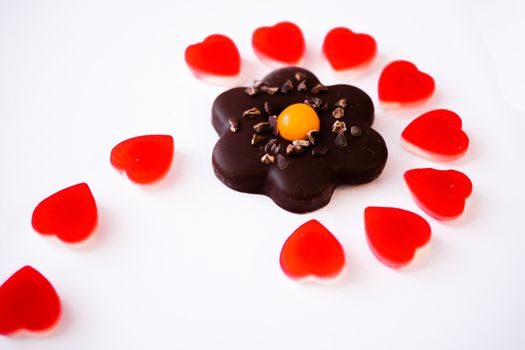 confectionery - marmalade in the form of a heart and cookies in the form of a flower