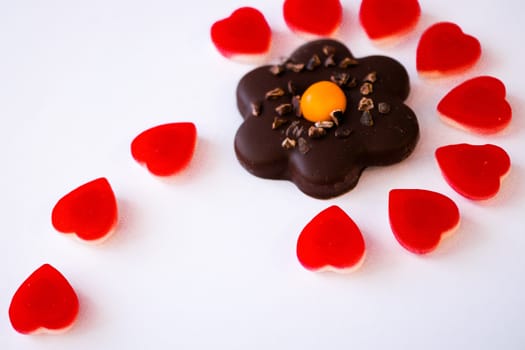 confectionery - marmalade in the form of a heart and cookies in the form of a flower