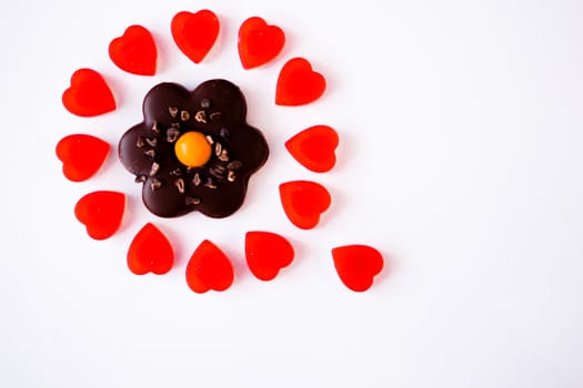 confectionery - marmalade in the form of a heart and cookies in the form of a flower