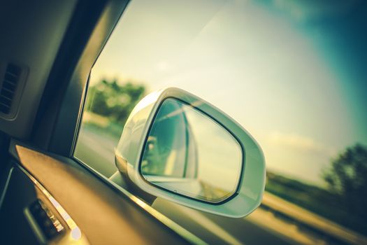 Bling Spot in the Car Mirror. Transportation Theme.