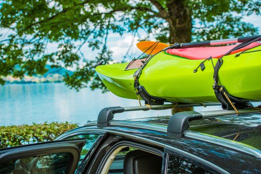 Vacation on the Water. Kayak on the Car Roof During Summer Vacation Trip.
