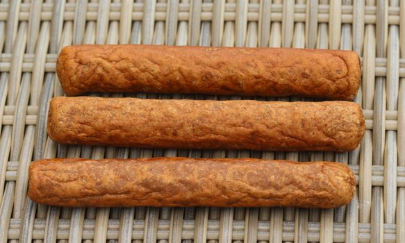 close up of frikandel, a traditional Dutch snack, a sort of minced meat hot dog