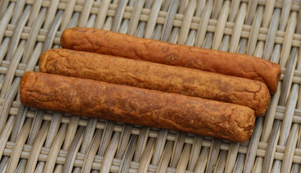 close up of frikandel, a traditional Dutch snack, a sort of minced meat hot dog