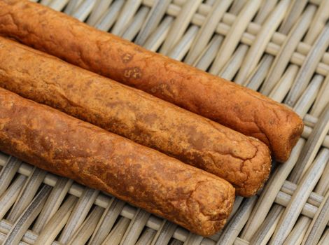 close up of frikandel, a traditional Dutch snack, a sort of minced meat hot dog