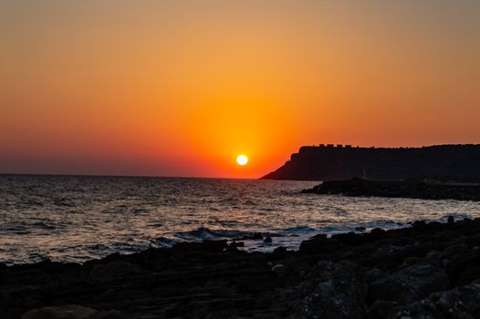 Sunrise at Sissi, Crete. Sunrise over the sea at Sissi on the north coast of the Island of Crete, Greece