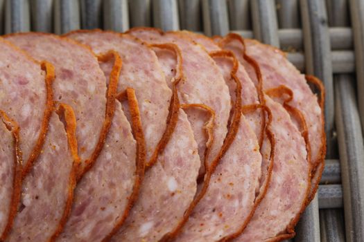close up of Dutch grilled sausage "grillworst" on wooden table background