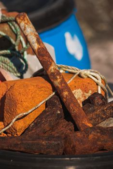 An old rusty hammer in the harbour