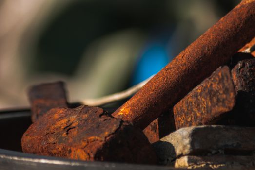 An old rusty hammer in the harbour