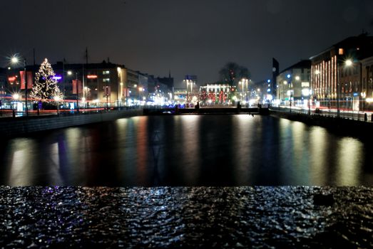 Reflections of a night time cityscape