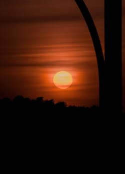 Orange vibrant sunset with some clouds