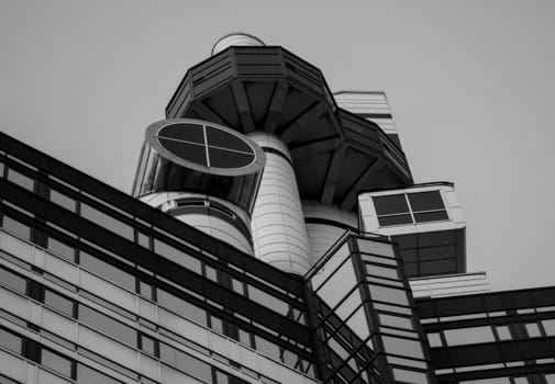 Looking up at black and white architecture