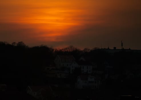 Orange vibrant sunset with some clouds