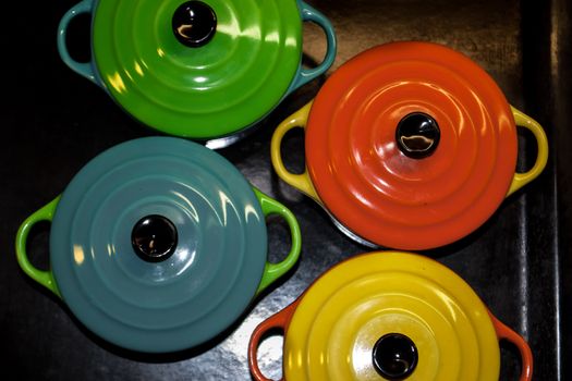 Four colorful and vibrant bowls from above