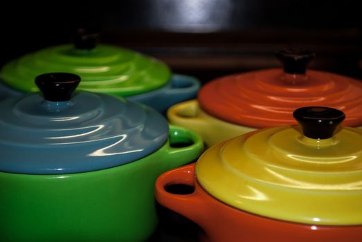 Four colorful and vibrant bowls aligned