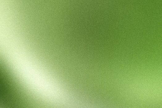 Light shining on green wave metallic wall, abstract texture background