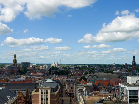 View over historic part of Groningen city under blue sky with clouds, Netherlands