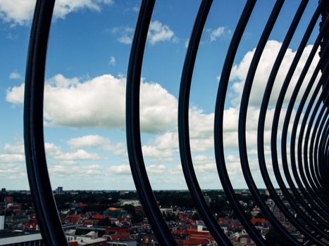 View over historic part of Groningen city under blue sky with clouds, Netherlands