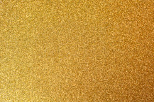 Gold festive background, close-up. Copy space for text. Horizontal. Celebration, holidays, sales, fashion concept, harvesting for mock up.