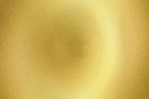 Light shining on gold rough metal sheet board , abstract texture background