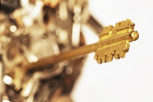 Many keys of different sizes. Keys on a white background, close-up. Selective focus, soft focus.