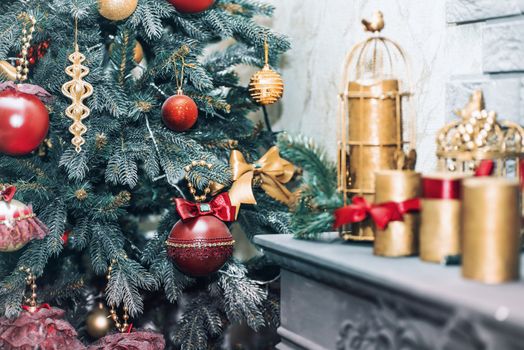 Xmas concept. soft selective focus.The decor on the Christmas tree on which the New Year's toys are hanging .