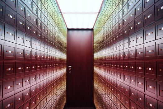The safe room is a multi-colored room of illusions. A room of illusions.The room is safe with a brown door. The room is illuminated by a multi-colored light.