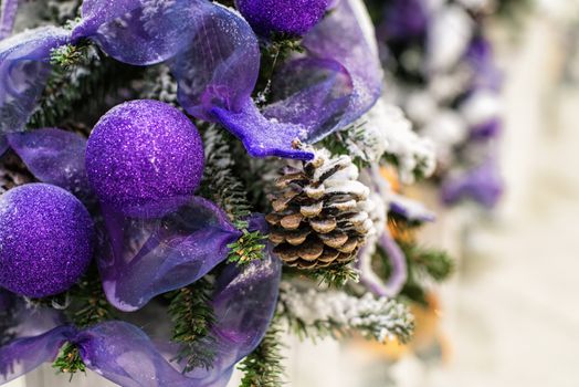 The decor on the Christmas tree on which the New Year's toys are hanging . Xmas concept. soft selective focus