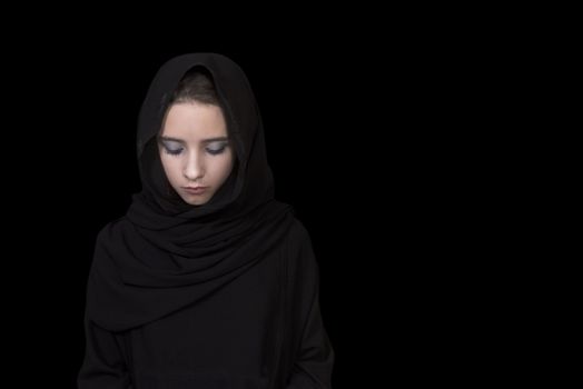 Arab girl close-up. Eyes of the Arab girl.Young arabian woman in hijab. close-up beautiful mysterious eyes eastern woman wearing a hijab