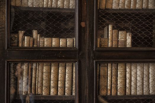 Old books. Background from old books. Bookshelf background.Old books are on the shelf in the closet.