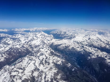 The bird's eye view of Alps snow mountain in Switzerland.