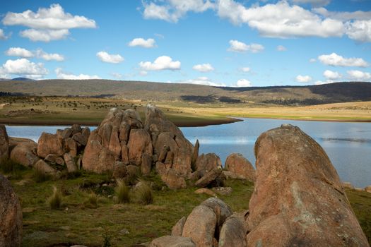 Scenic wilderness views of the Snowy High Plains, lakes tors and hills and plains of tufted snow grasses, herbs and heath. Snow gums and black sallee eucalypts also grow in some places.